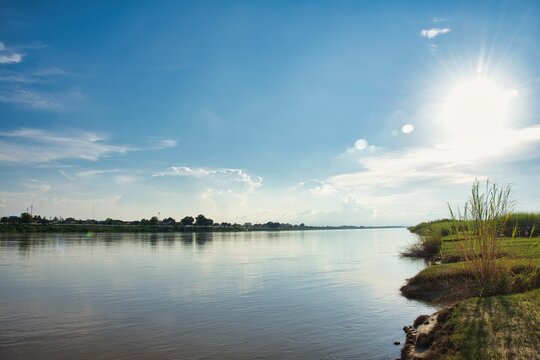 Beautiful time. View of Mekong River Vientiane, Laos. fisher men, boat on mekong, background city. High quality photo