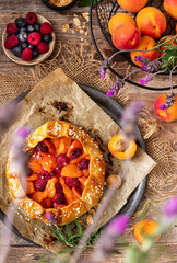 Apricot and raspberry galette, pie, cake with almond. Summer food