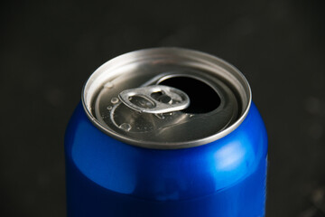 Open jar of delicious cold soda drink on a dark background. Feeling cool on a hot summer day