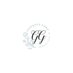 Fototapeta na wymiar Initial letter GG handwriting with floral frame template