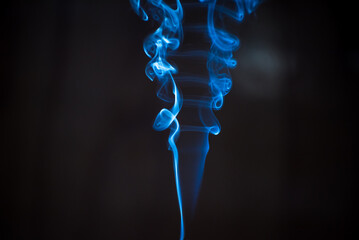  blue smoke, witchcraft, palo santo, black background, textures - Powered by Adobe