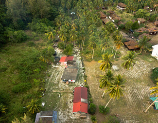 Fototapeta na wymiar Aerial drone view of rural settlements scenery in Besar Island, Mersing, Johor, Malaysia