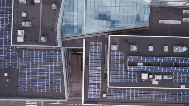 Aerial view of the solar panels on the roof of a shopping mall building in Finland