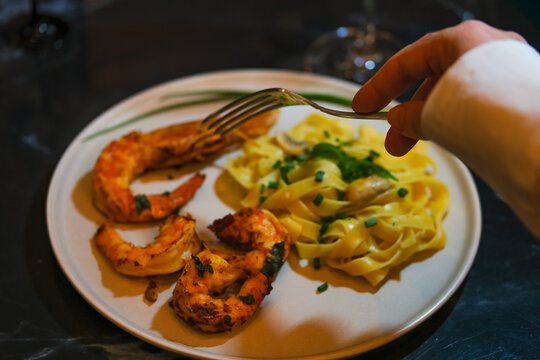 Pasta with shrimps and langustine. Seafood. Home cooking.