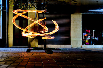 Street artist fire eater on Vitosha boulevard, Sofia, Bulgaria