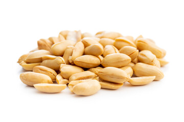 Roasted peeled peanuts isolated on white background.