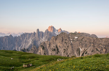 Mountains Panorama of the Dolomites at Sunrise with clouds