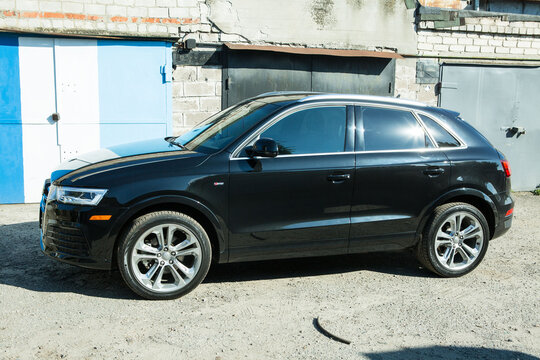 AUDI Q3 in black. Subcompact luxury crossover Audi Q3. Side view.