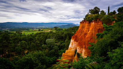 Deeply pigmented cliffs in the village of Roussillon