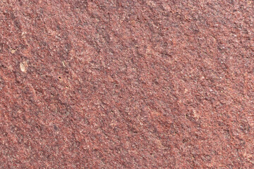 Textura de piedra natural, de cerca en color rojo