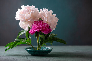 Still life with bouquet of peony flowers. Pink and white peonies still life. Flowers background, greeting card