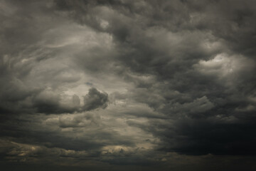 Dramatic dark storm clouds, abstract background, summer rain.