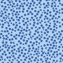 Simple vintage pattern. Small blue flowers on a light blue background. Fashionable print for textiles and wallpaper.