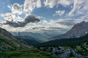 Beautiful day in the Italian Dolomites mountains with lakes and pastures. 
