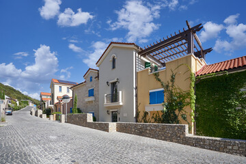 Street in a residential district with beautiful houses in europe