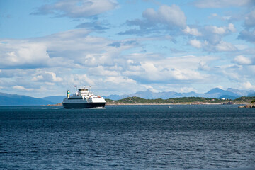 Mountain view an ferry in Hadselfjord , Northern Norway- Europe