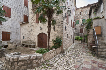 Courtyard in the old town of Kotor and stone houses