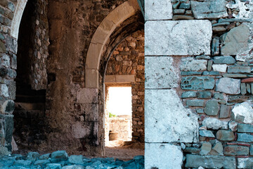 Arch entrance of Methoni castle, stone building, light and shadows, ancient historical place