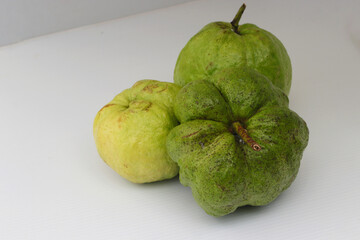 a group of fresh ripe Crystal guava (Psidium guajava) isolated on white background
