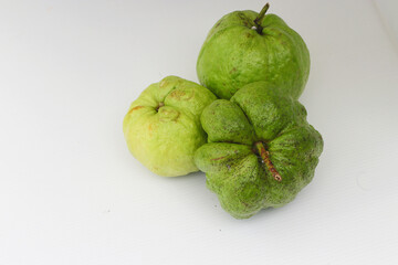 a group of fresh ripe Crystal guava (Psidium guajava) isolated on white background