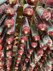 Traditional french salami, raw, smoked and cold-aged. The white mold that forms on salami when it...