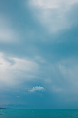 Fototapeta premium blue sea and cloudy sky on sunny summer day.