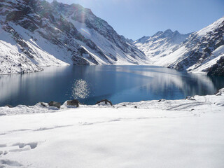 Fototapeta premium Ski in chile on a sunny day with lots of snow. South America.