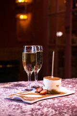 dessert and champagne on the table in the restauran