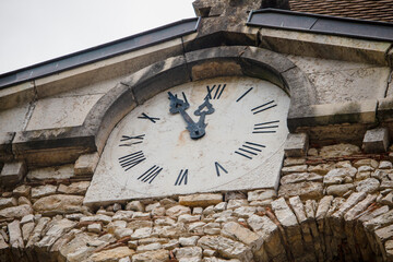 Old historical town clock in city of Cremieu, France