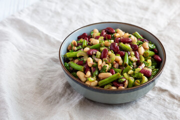 Homemade Three Bean Salad in a Bowl, side view. Copy space.