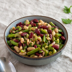 Homemade Three Bean Salad in a Bowl, side view.