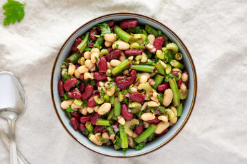 Homemade Three Bean Salad in a Bowl, top view. Flat lay, overhead, from above.
