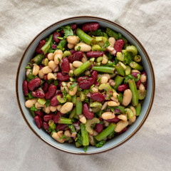 Homemade Three Bean Salad in a Bowl, top view. Flat lay, overhead, from above.