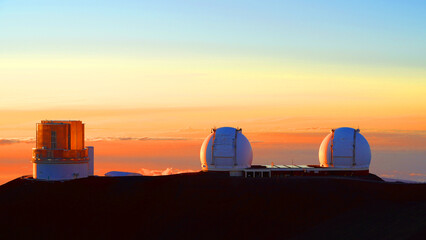 Fototapeta na wymiar The observatories at Mauna Kea, a huge volcano on the Big Island of Hawaii