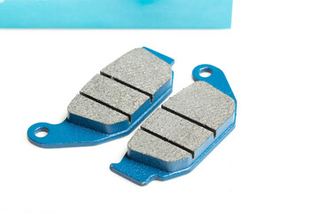 Motorcycle brake pads isolated on white background, close-up image