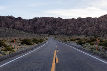 Scenic highway in the mountain landscape. Sunset Sky. State Route 120, California, United States of America. Adventure Travel