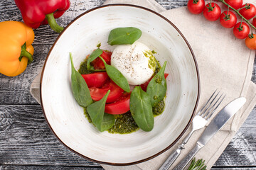 burrata salad, burrata salad on a white wooden background, top view