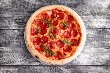Pizza, pizza on a wooden white background, top view