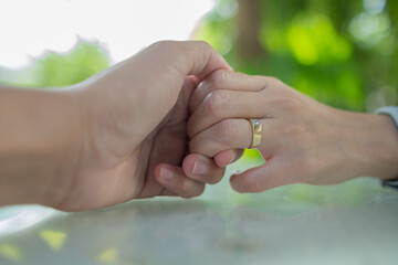 hand touching, feeling love, lovers holding hands
