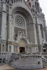 Majestic entrance of Basilica of Sainte-Anne-de-Beaupre, Cathedral, Quebec an important Catholic sanctuary, which receives about a half-million pilgrims each year. 