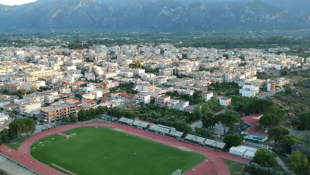 Aerial video over soccer stadium of Sparti city in Lakonia, Greece