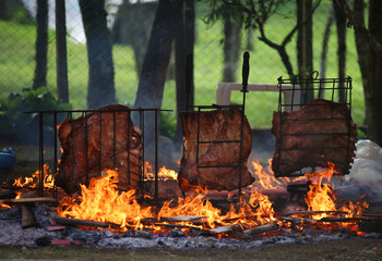 Brazilian Barbecue, rib on ground fire