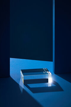 Front View Of Transparent Podium In Front Off Blue Wall Background Abstract Content