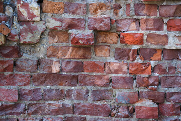 The texture of old brick wall in close-up.