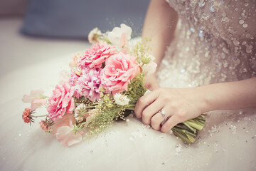 Bride holding the wedding bouquet, Detail image cut