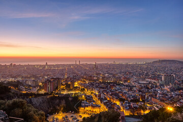 View over Barcelona beforse sunset with the Mediterranean Sea in the back