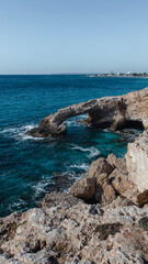 Fototapeta na wymiar Beautiful seascape with sea cave arch love bridge in Ayia Napa, Cyprus