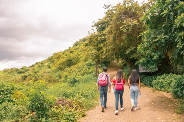 Three university students traveling to their campus in a mountainous area in Jinotega Nicaragua. Photo with copy space