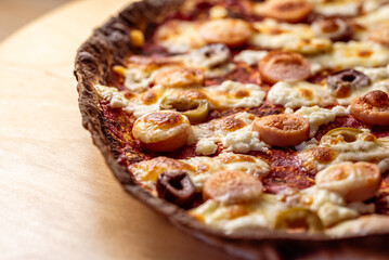 Tasty thin dough pizza with a crispy crust