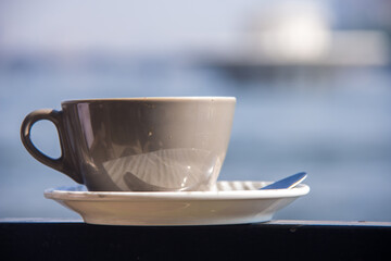 Cup of Coffee Nile view, shot is selective focus with shallow depth of field. Photos taken at Cairo Egypt